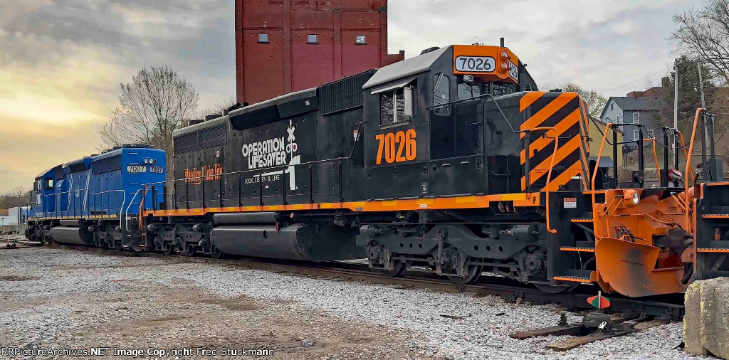 WE 7026